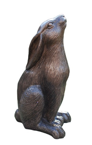 Bronze sculpture of a sitting hare moongazing