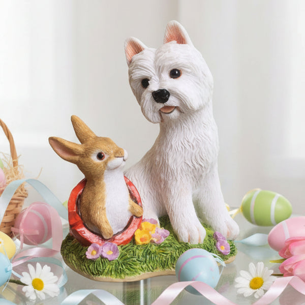 A decorative figurine of a white West Highland terrier dog sitting beside a small brown rabbit in a plant pot, set on a grassy base with small flowers