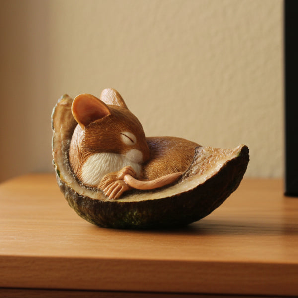 Mouse sleeping In Conker Shell