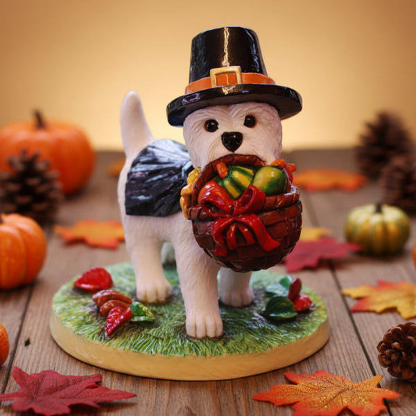 Dog figurine wearing a pilgrim hat with a basket of cornucopia
