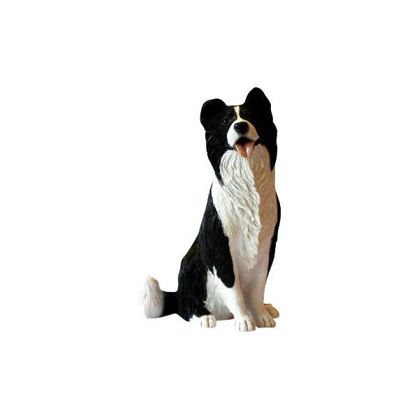 Black and white Border Collie sitting sculpture